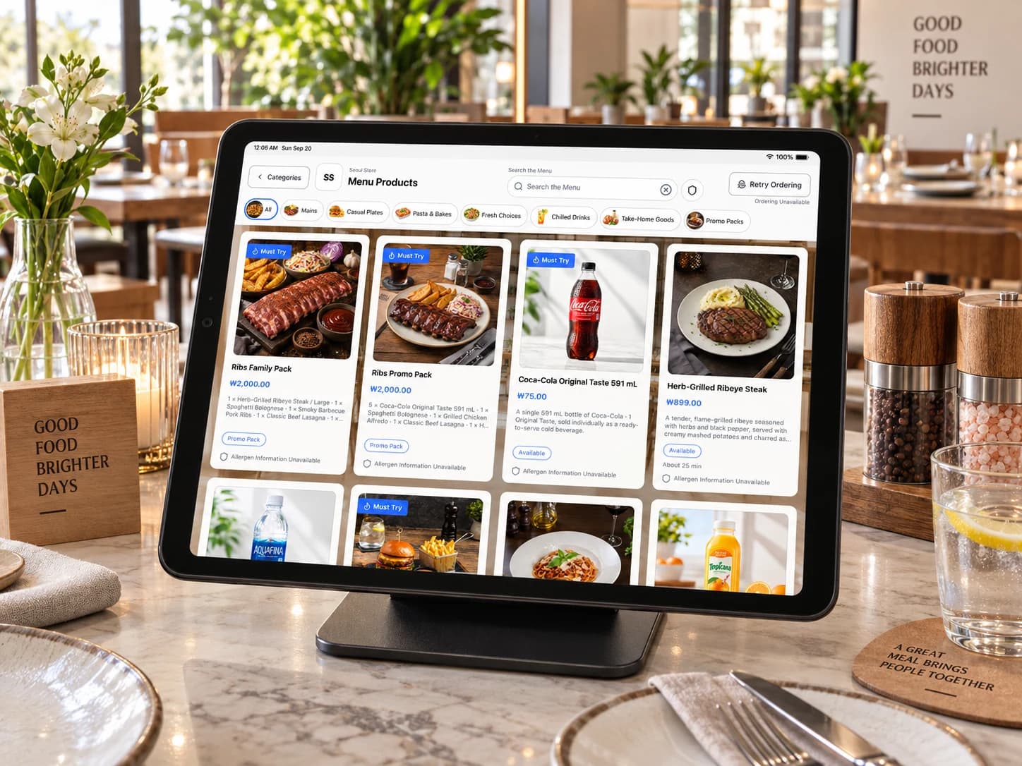 Guest menu product grid displaying Ribs Family Pack and Ribs Promo Pack with photos, fixed prices, and component descriptions beside individual items.