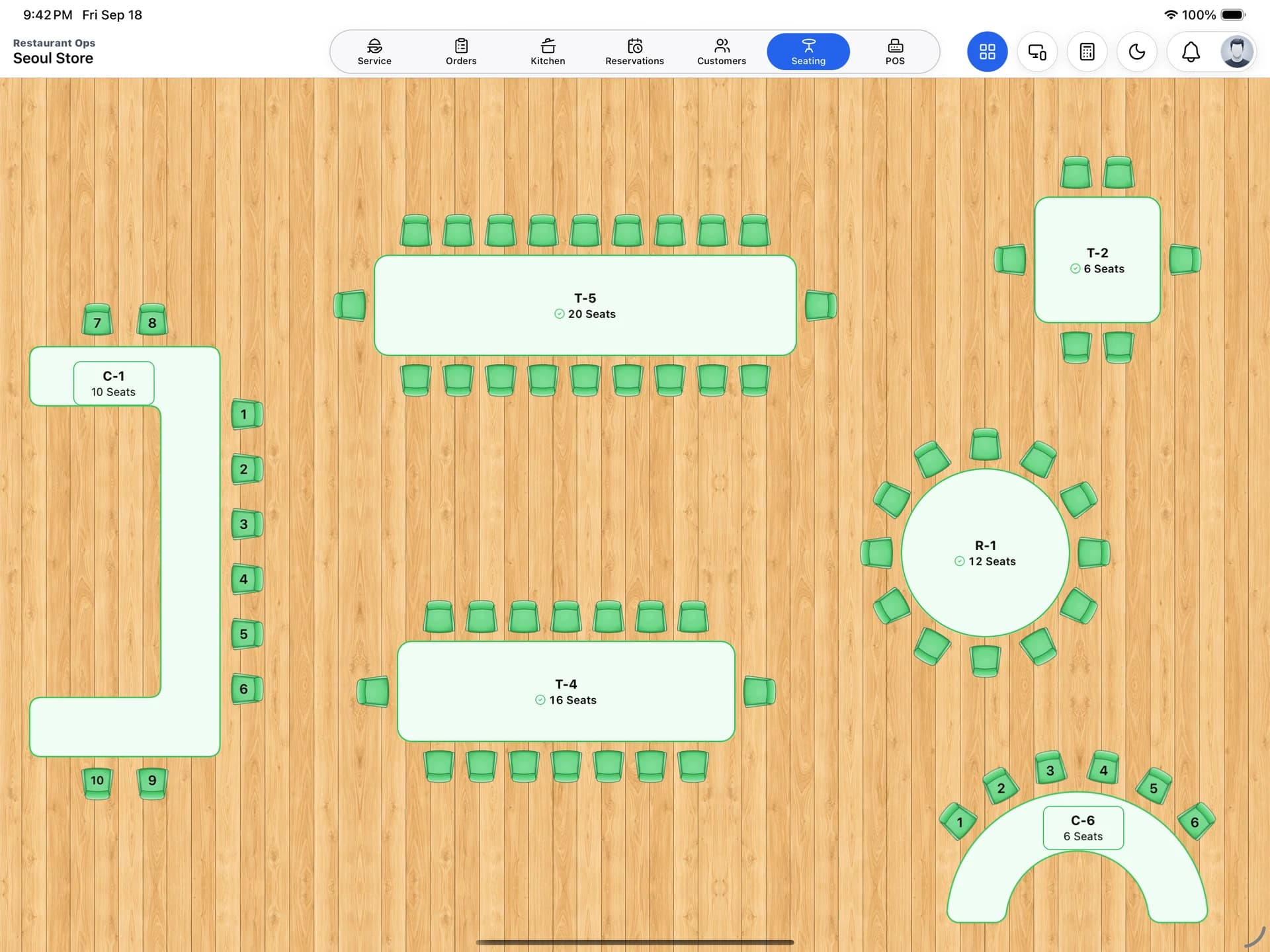 Restaurant Seating floor showing round and rectangular tables with capacities, plus counters with individually numbered seats.